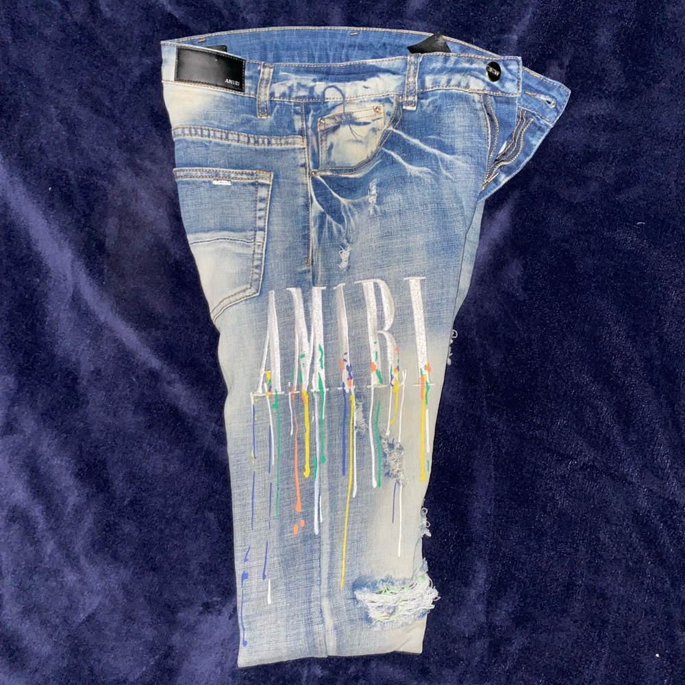 AMIRI Blue Skinny Jeans with Artistic Drip Design